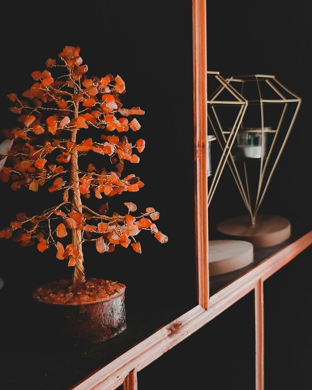 a tree with orange leaves