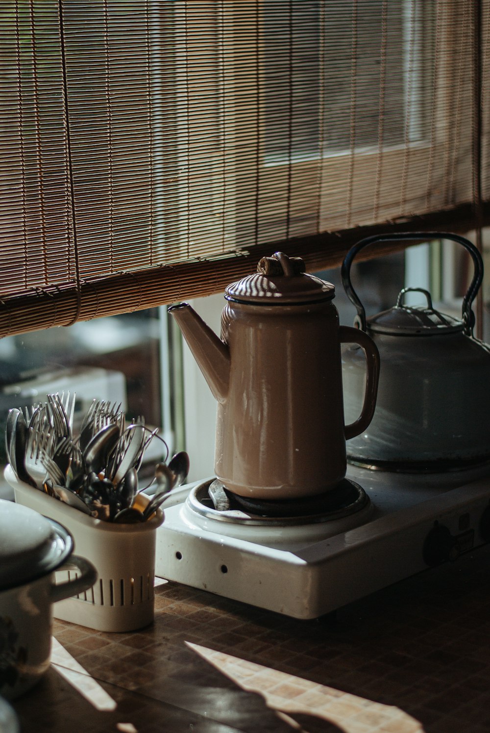 a tea kettle on a stove