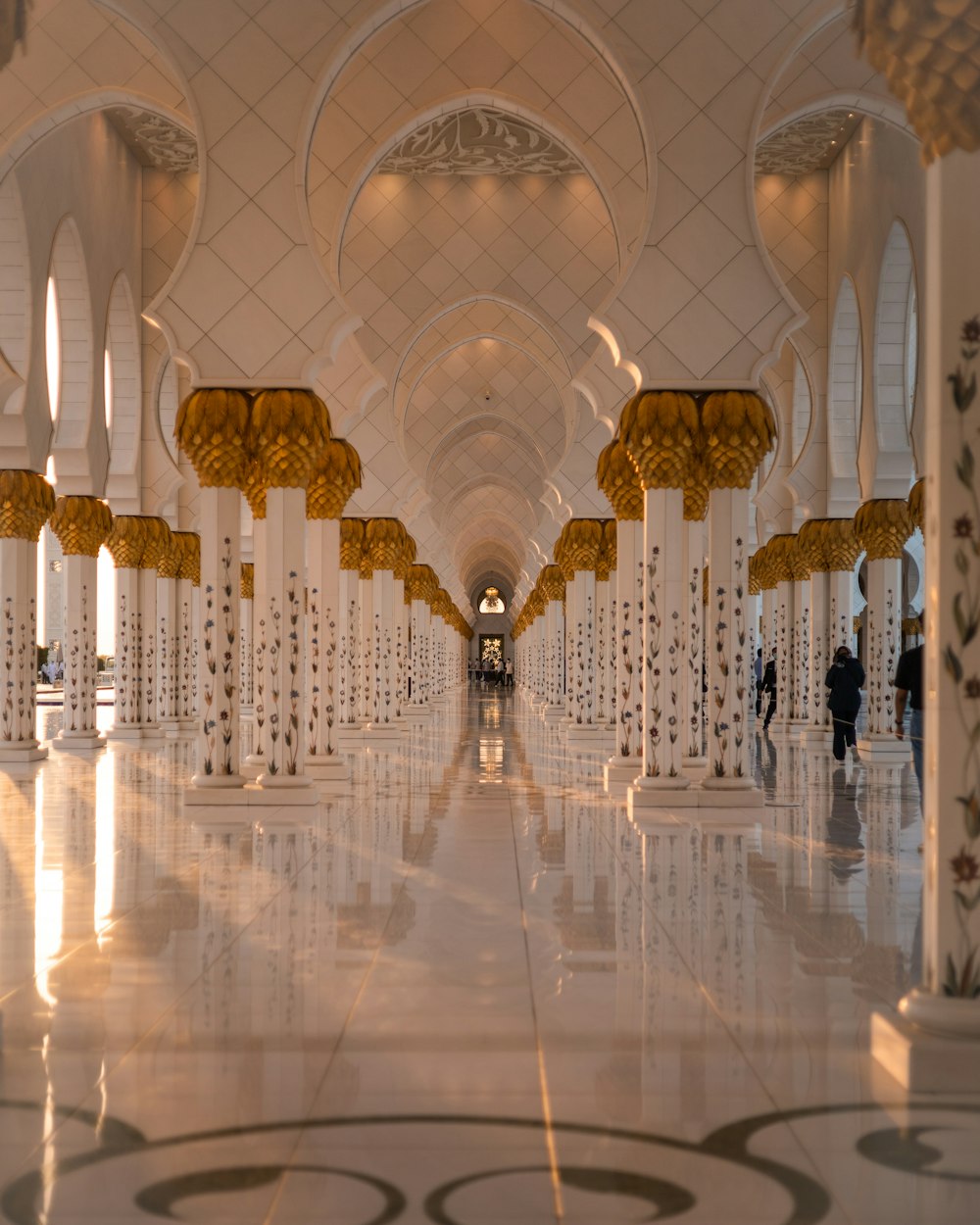 a large ornate building with columns and arches