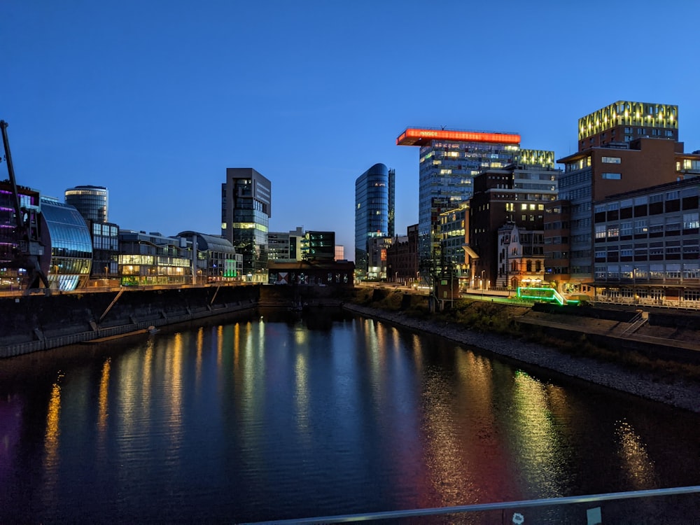 a body of water with buildings along it