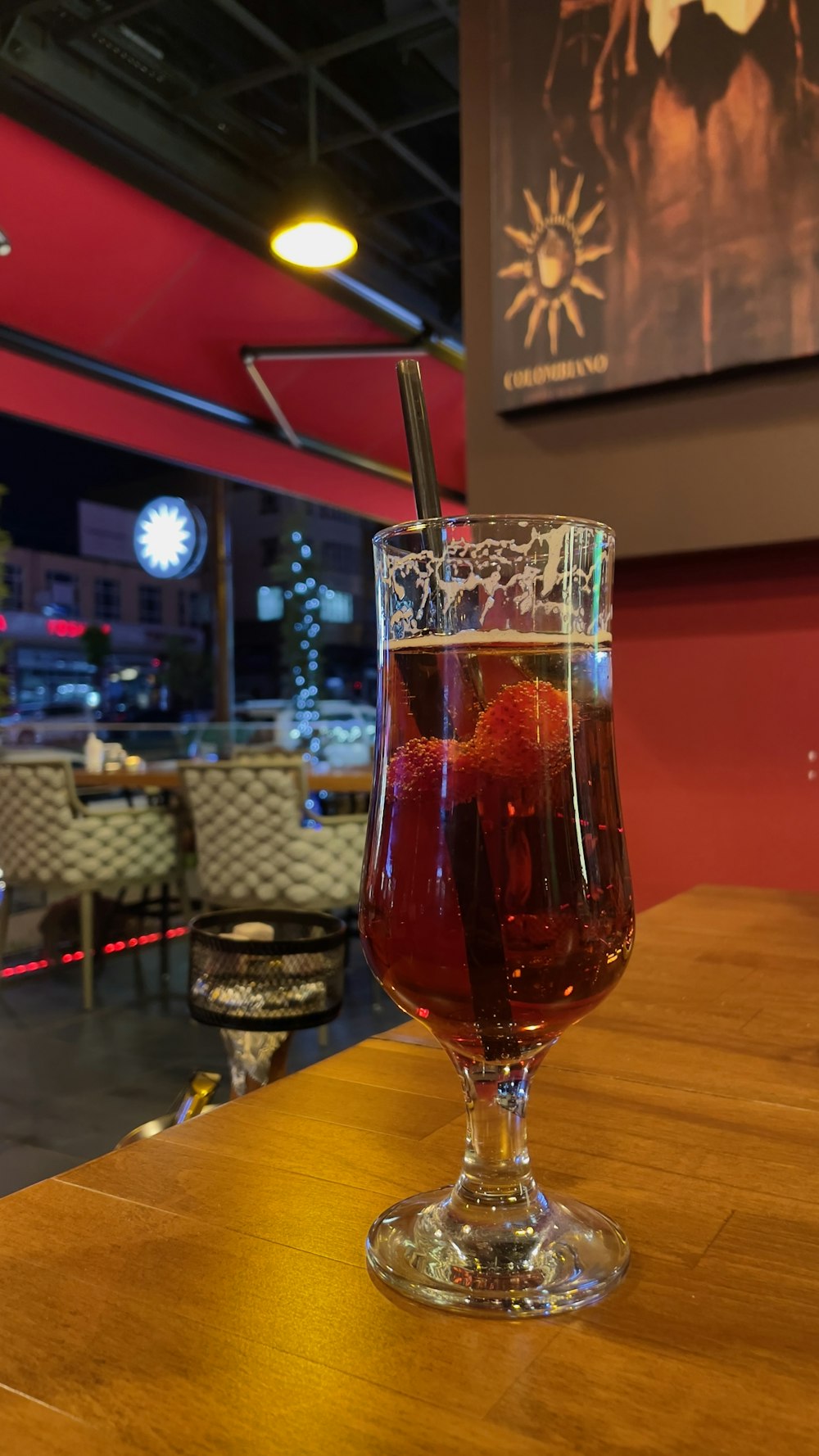 a glass of beer on a table