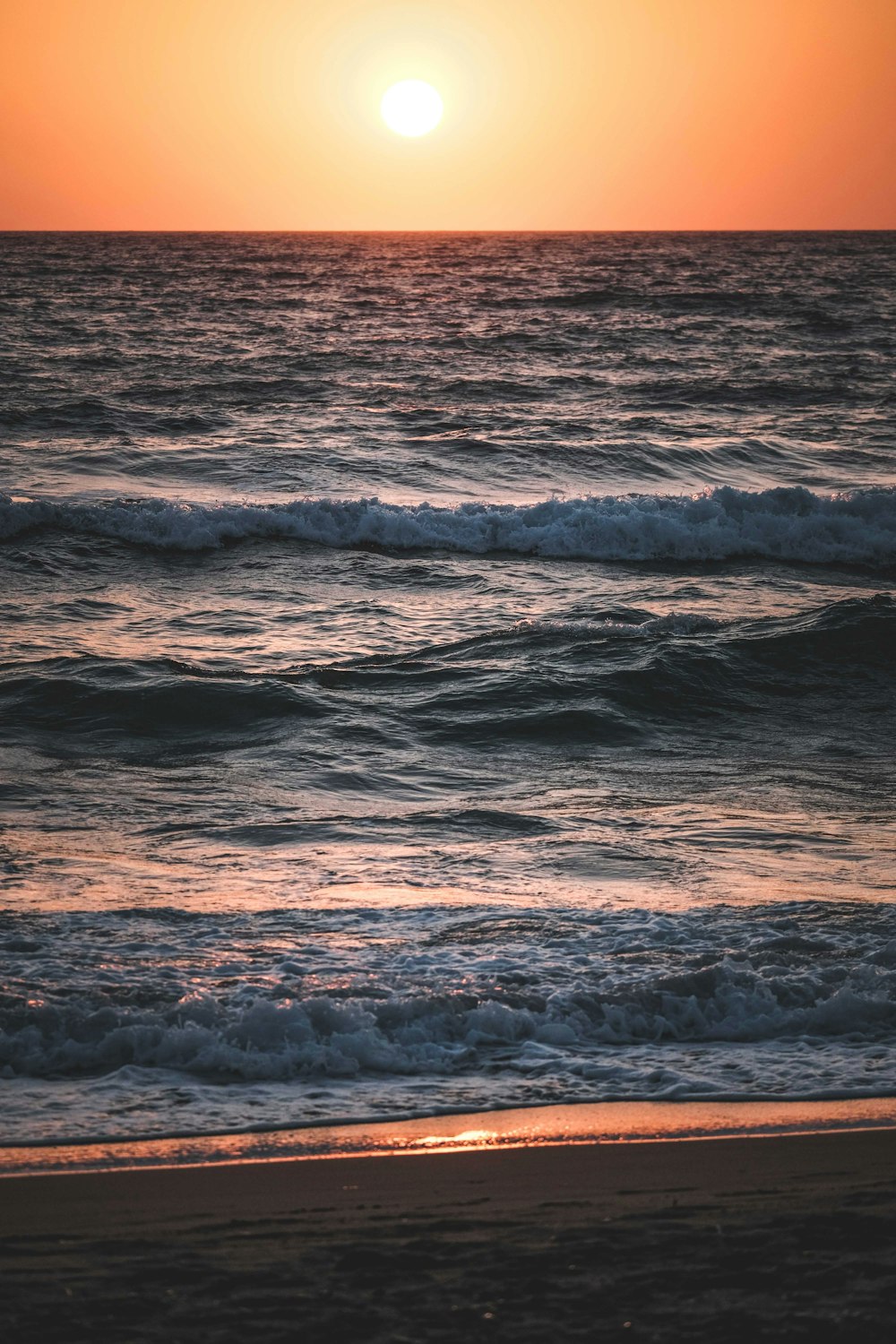 a sunset over the ocean