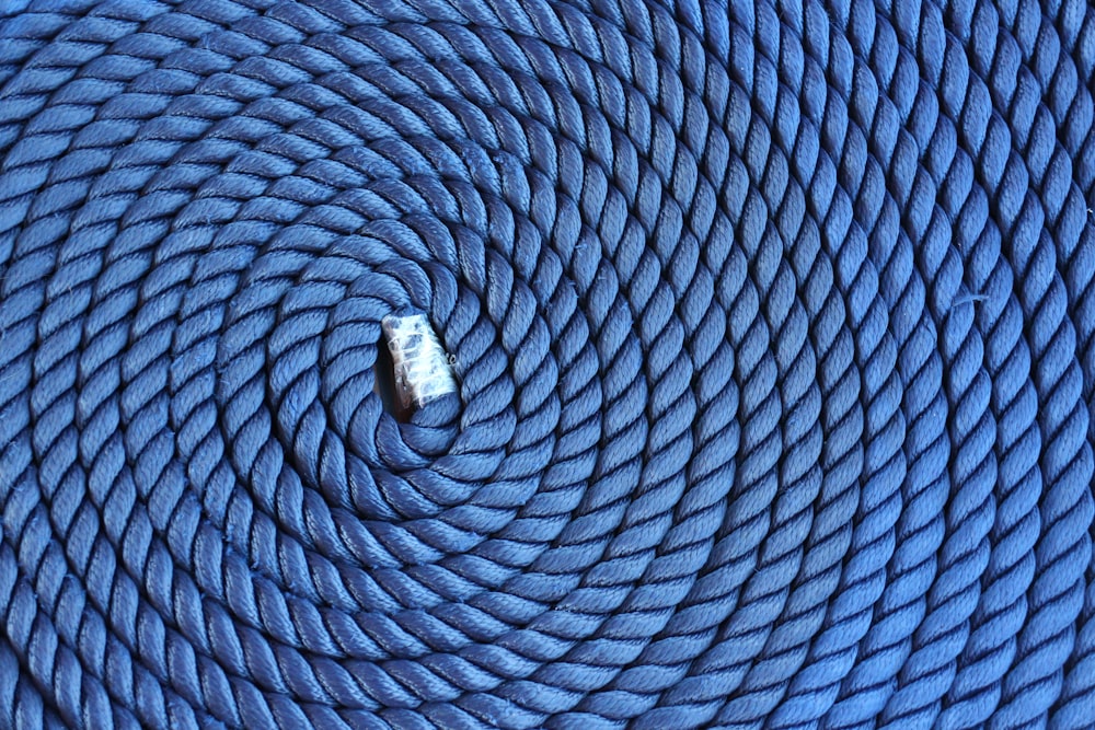 a small white object on a blue surface