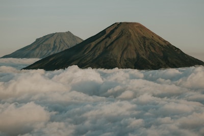 a mountain above the clouds