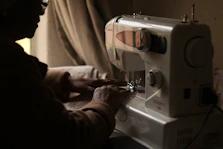 a person using a microscope