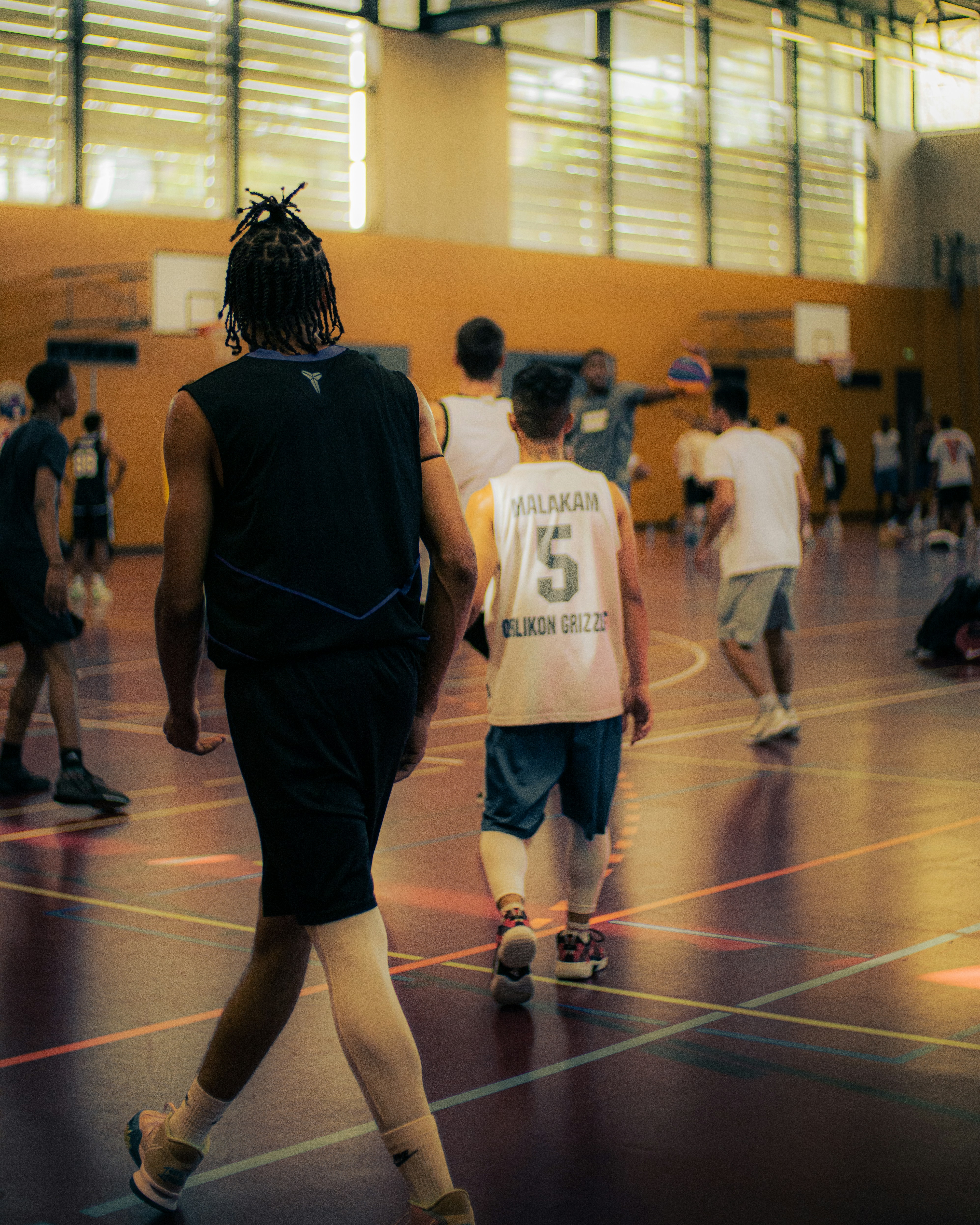 a group of people in a gym