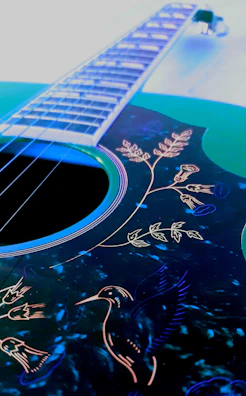 Traditional Purépecha motifs subtly engraved on a custom guitar