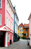 A picturesque street lined with colorful houses and shops.