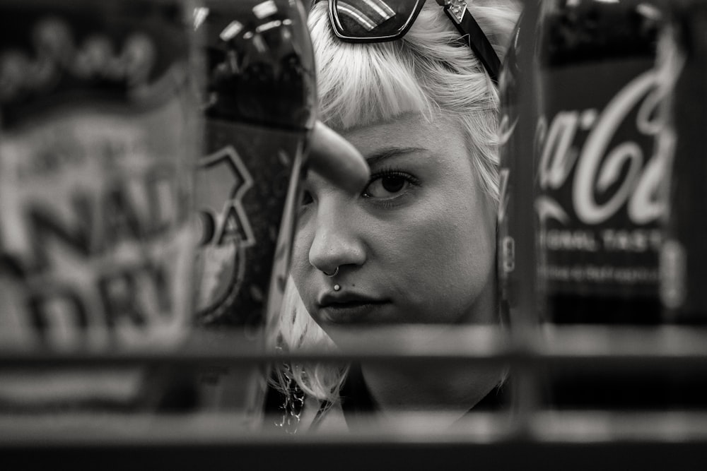 a woman looking through a window