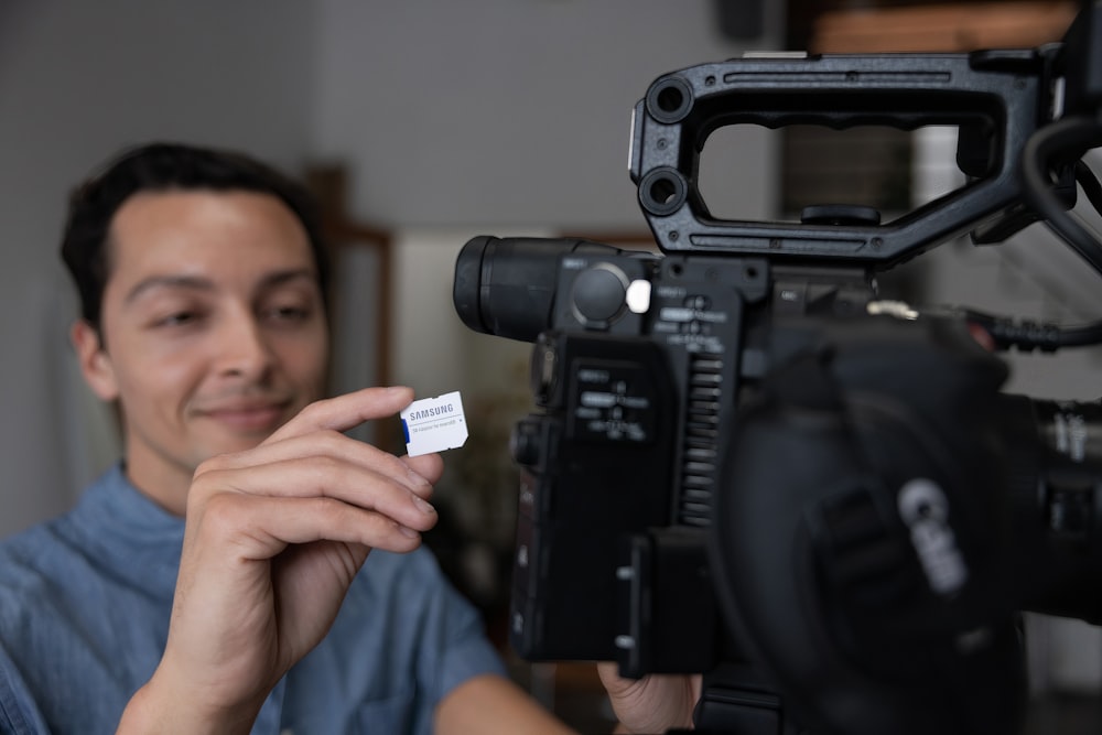 a man holding a camera