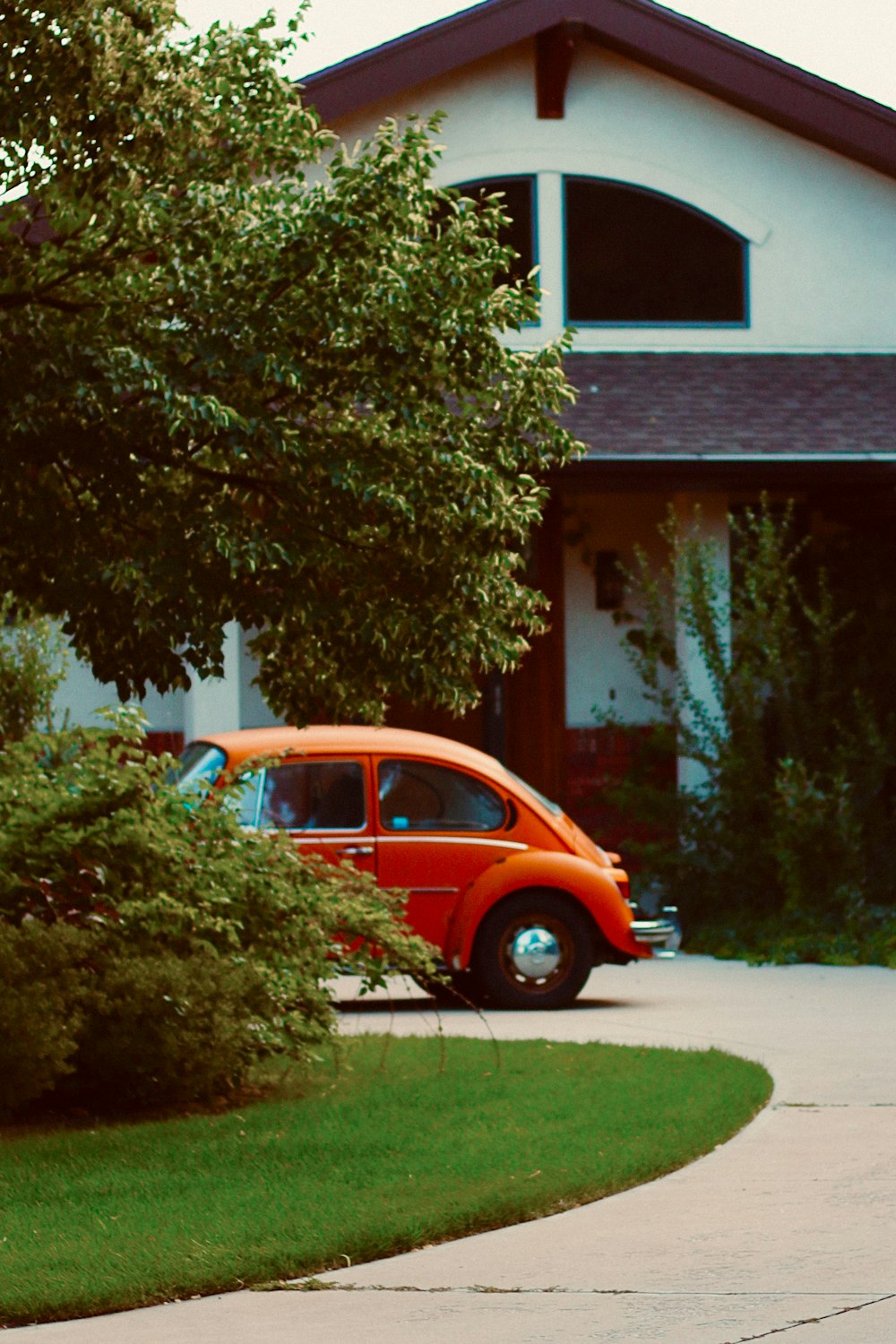 a car parked in front of a house