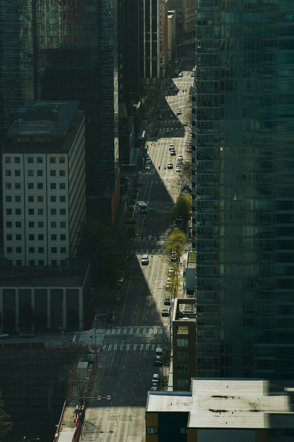 a street between two tall buildings