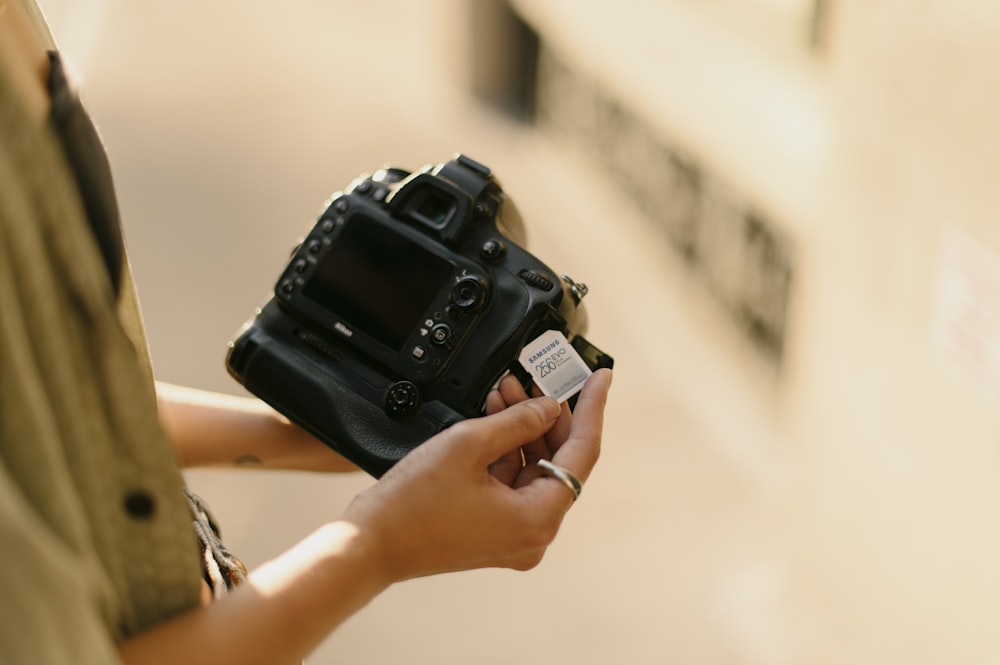 a person holding a camera