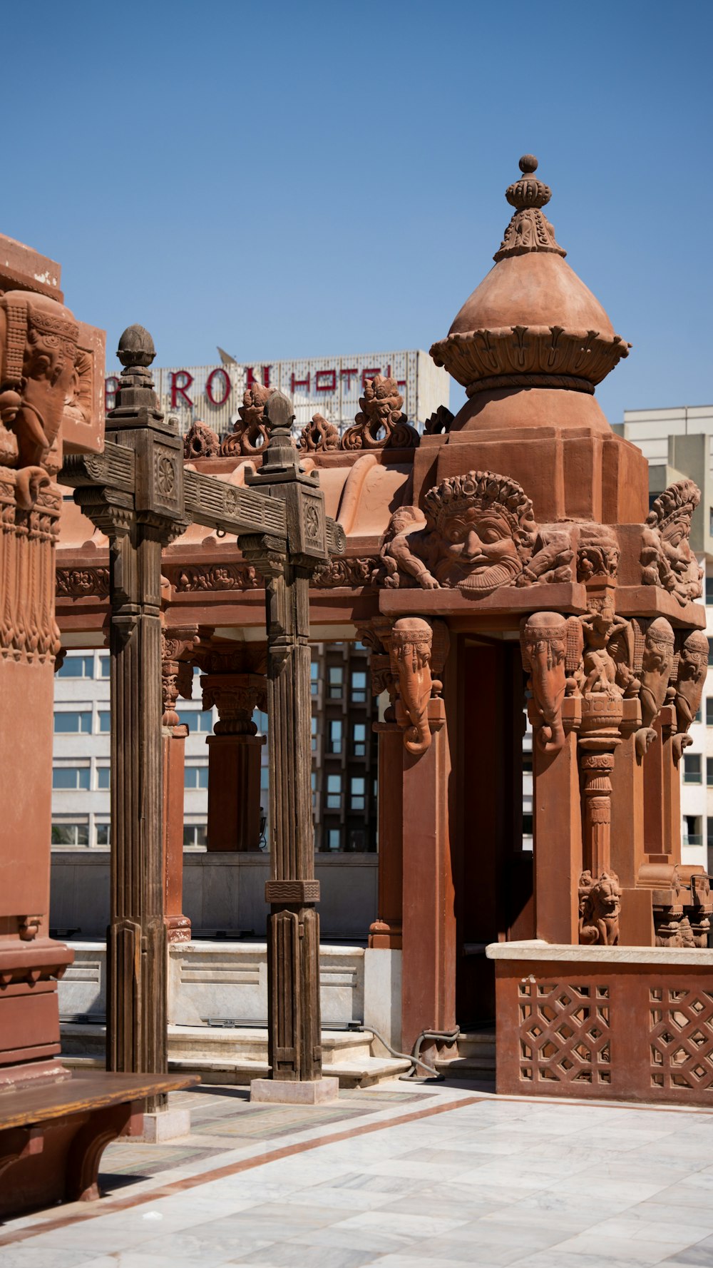 a building with pillars and a sign