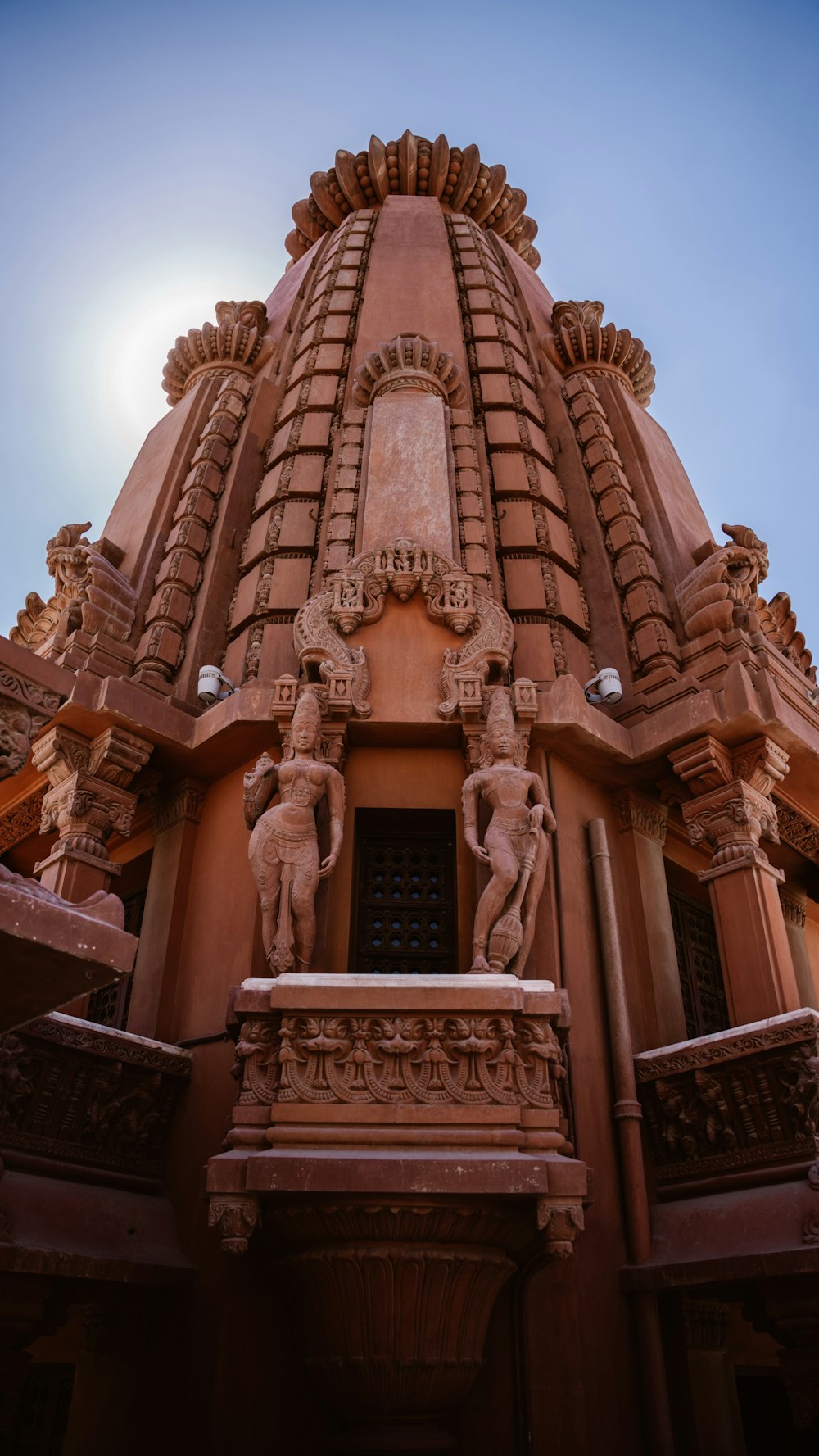 a building with statues on the outside