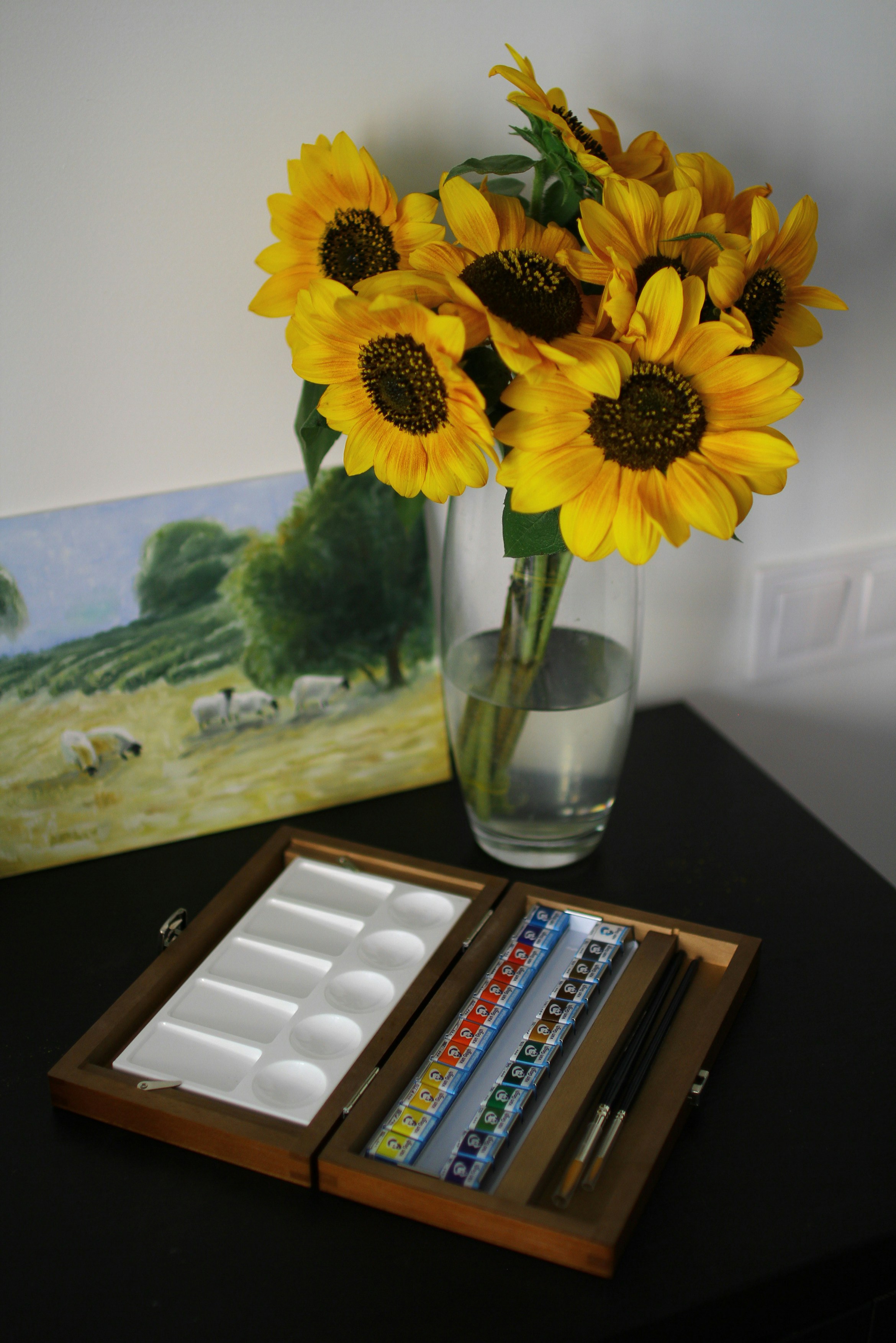 a vase with yellow flowers