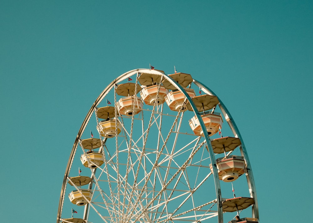 a ferris wheel with a blue sky