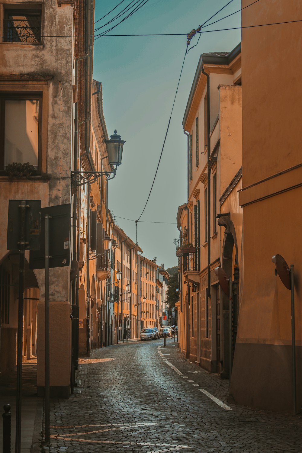 a narrow street with buildings on both sides