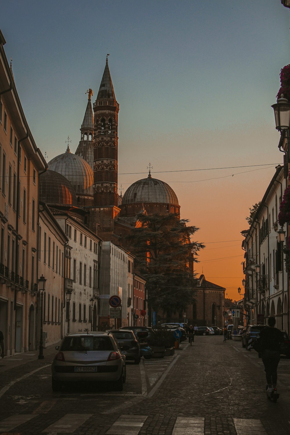 a street with cars and buildings on either side of it