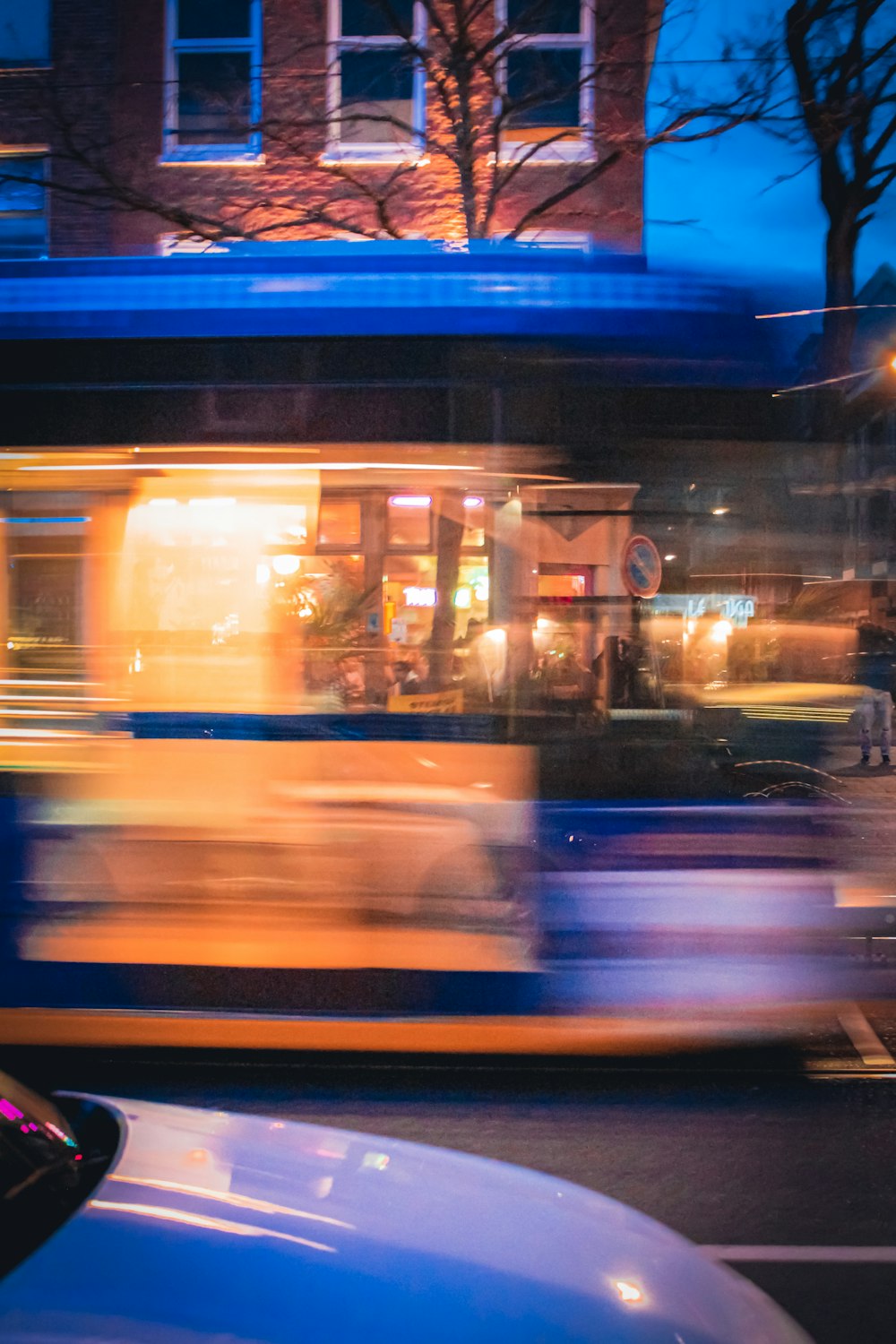 a blurry image of a city street at night