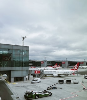 an airplane is parked at an airport