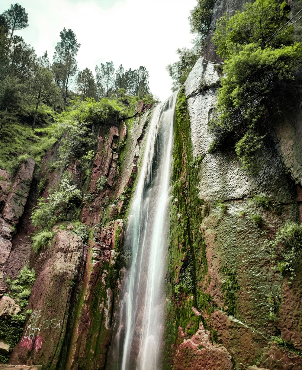 a waterfall in a rocky area