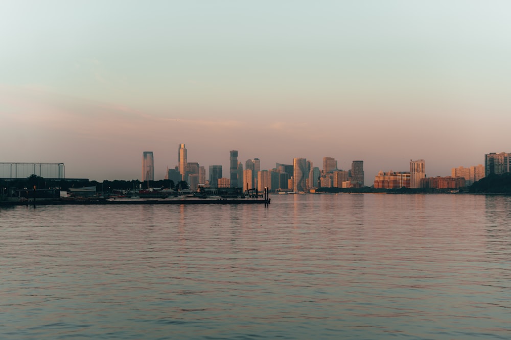 a city skyline across a body of water