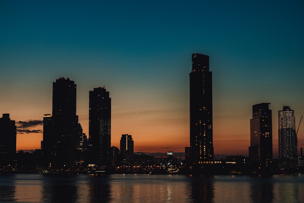 a city skyline at sunset