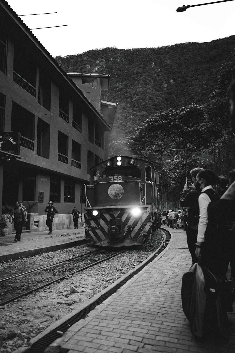 a train travels down the tracks