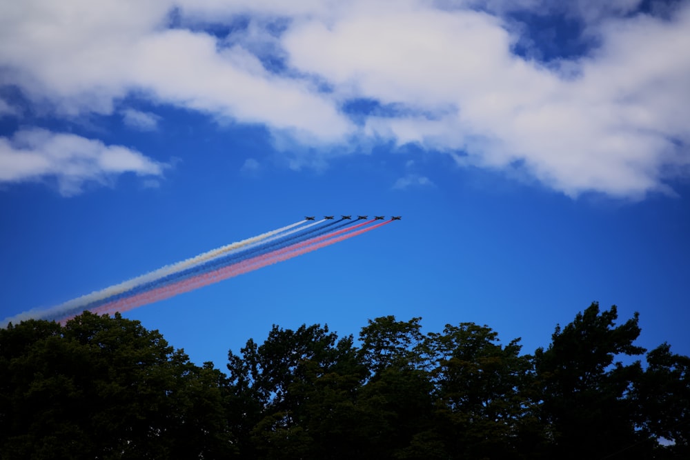 a group of jets flying in the sky