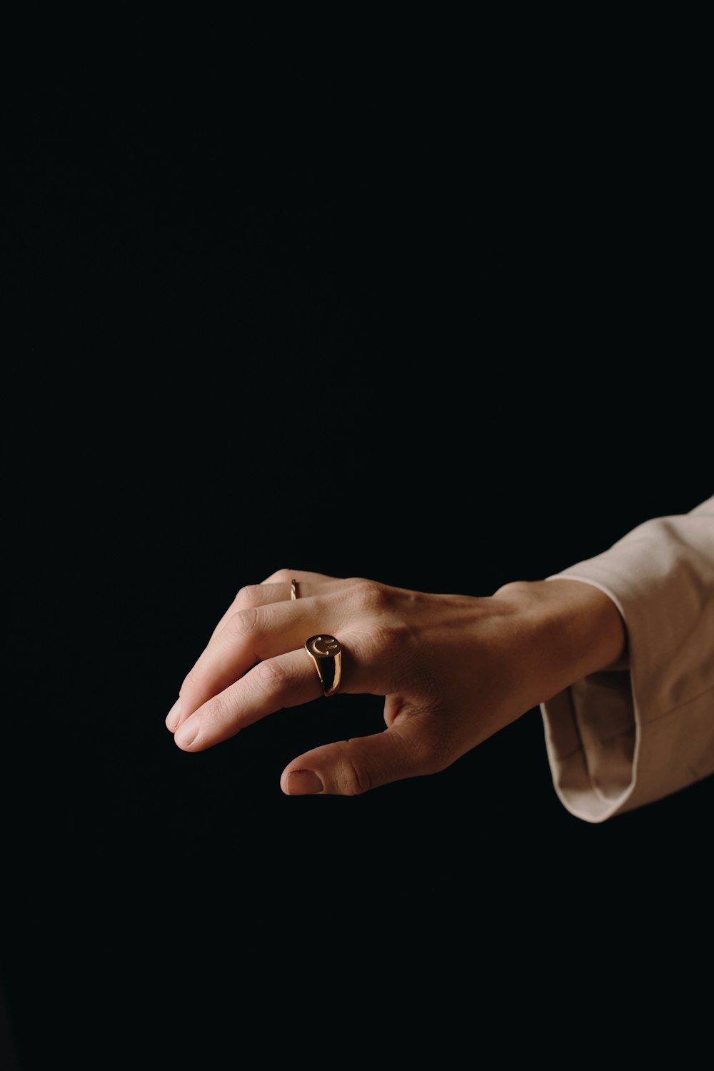 a person holding a ring