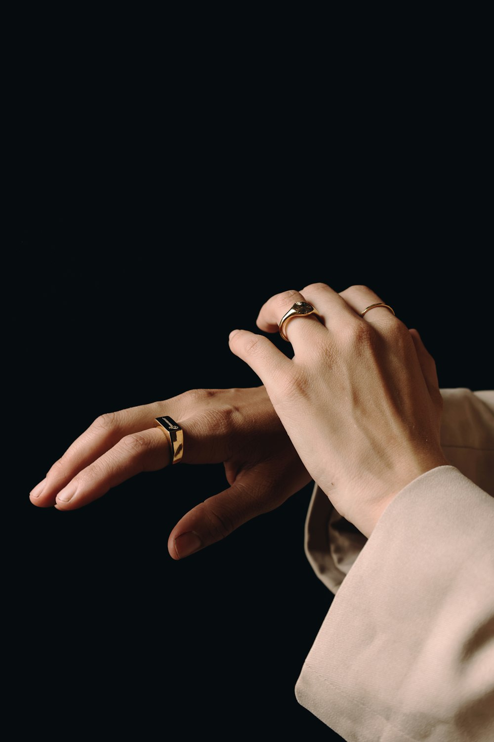 a person holding a ring