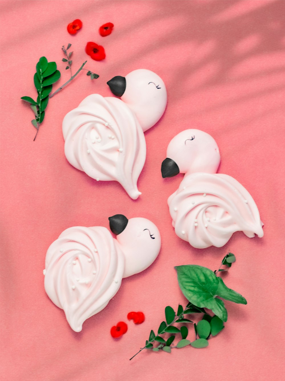 a group of white and red flowers