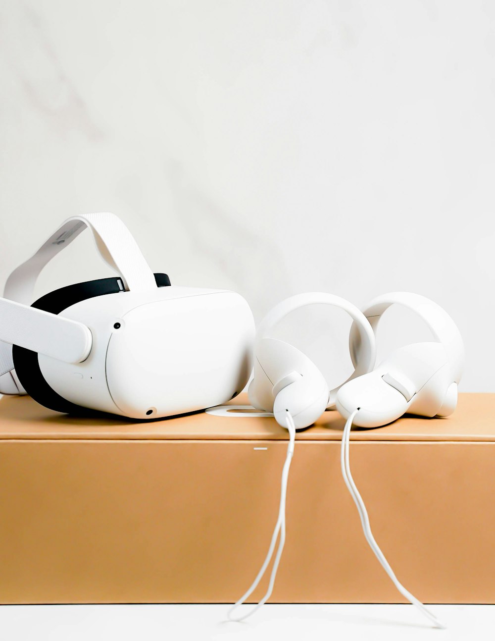 a group of white headphones