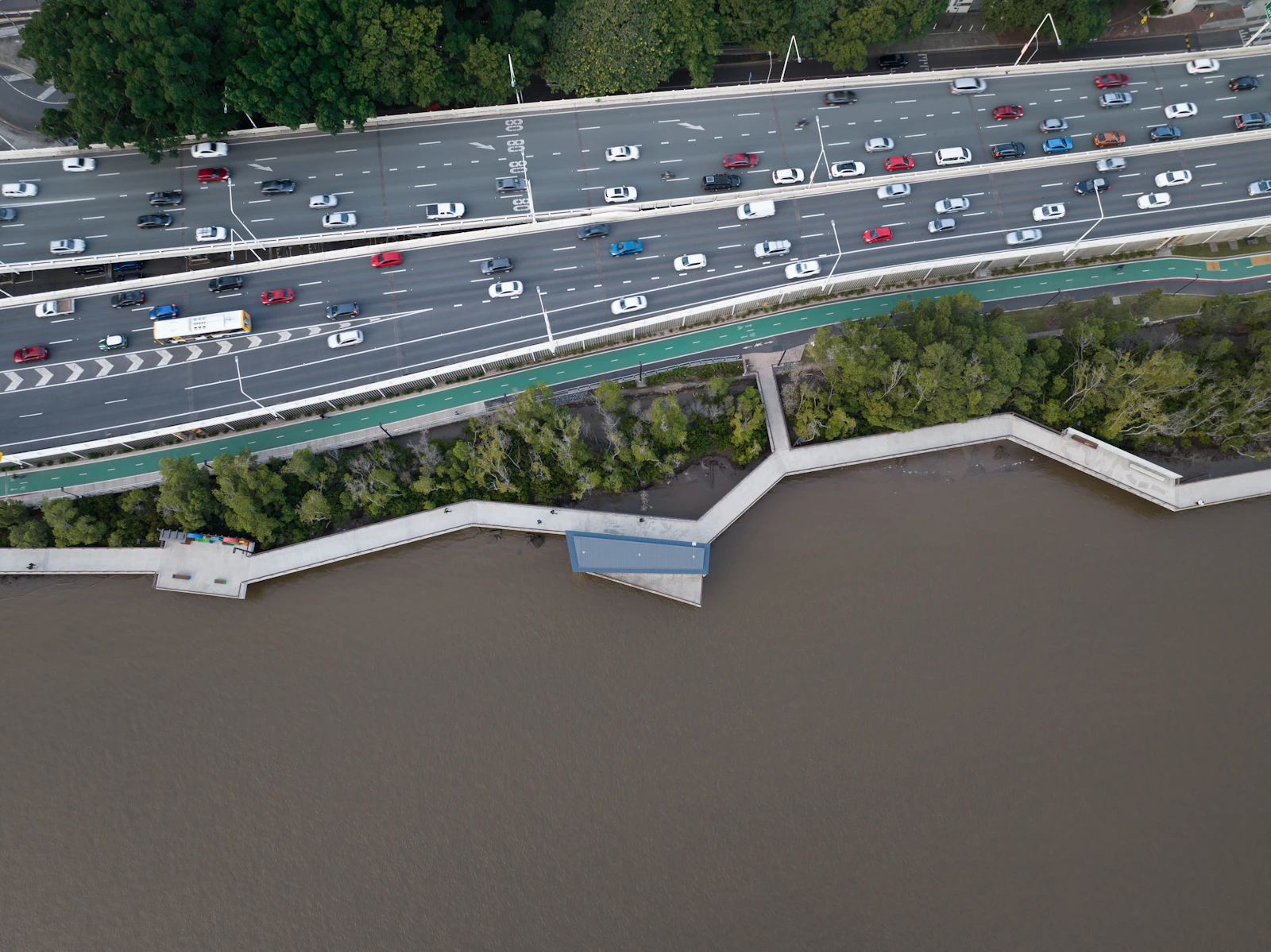 Cars sit in a large Brisbane parking area