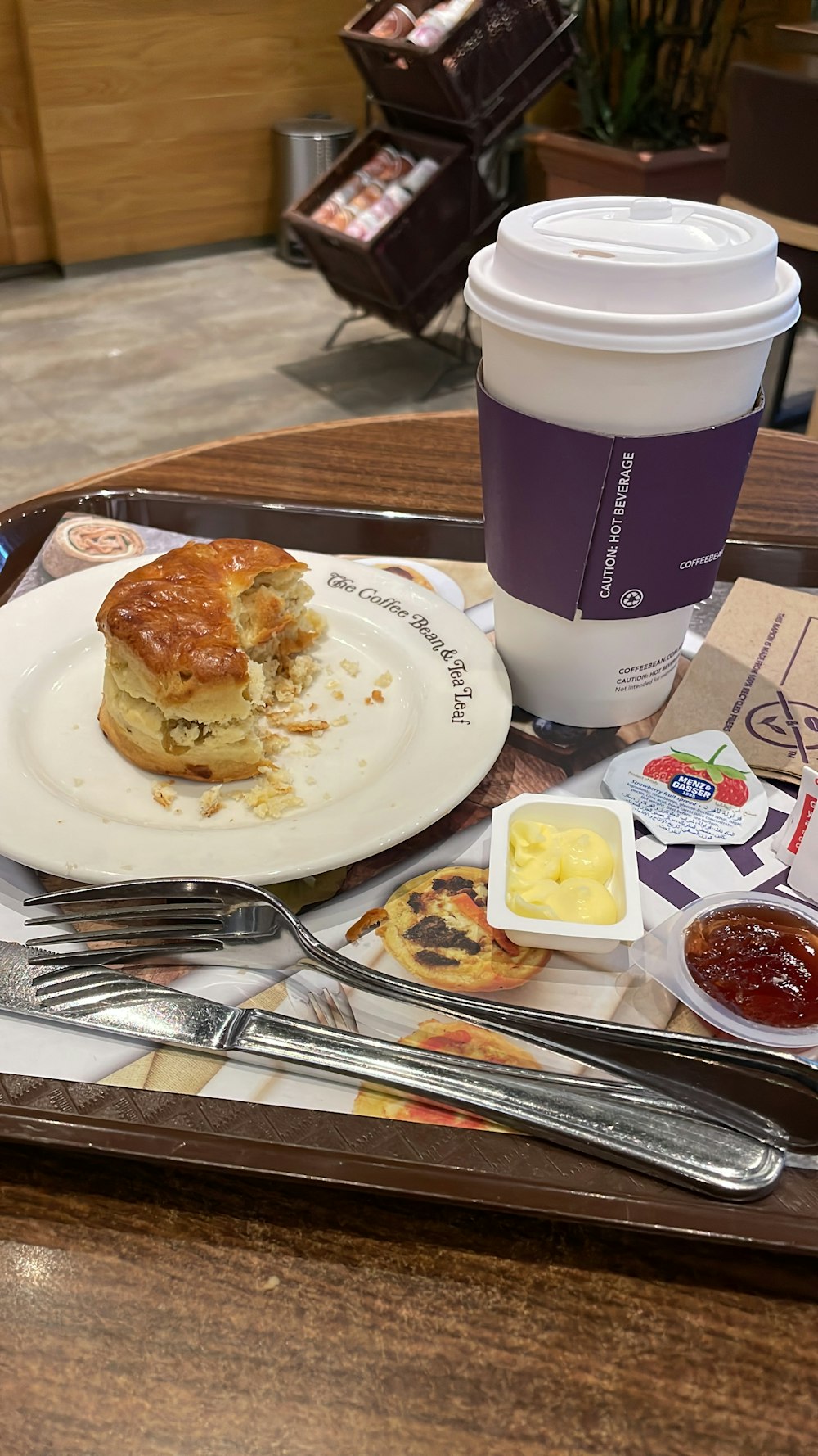 a plate of food and a drink on a table