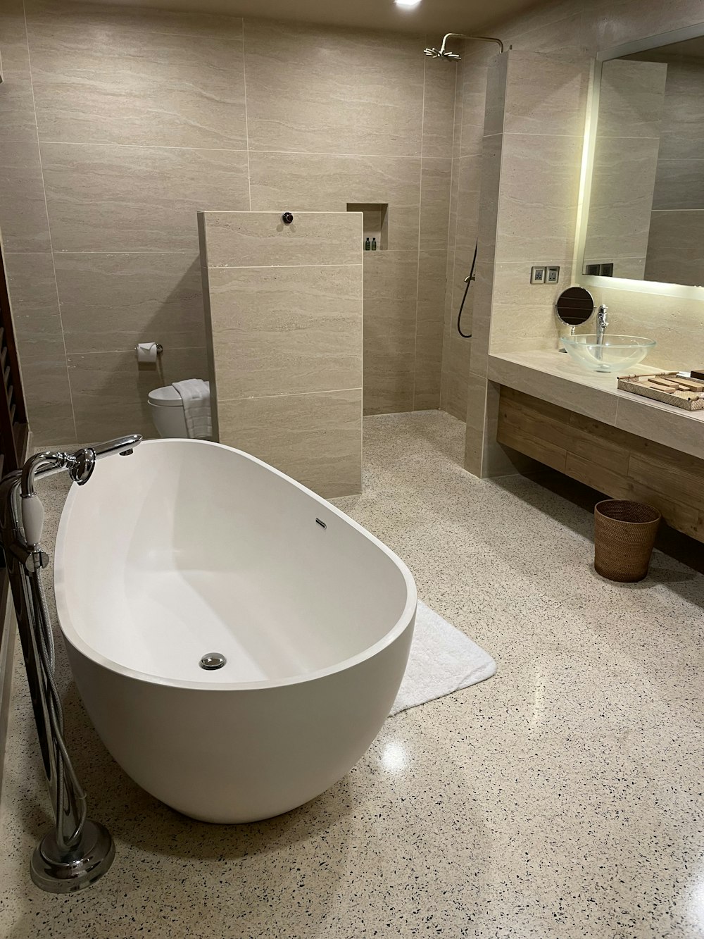 a bathroom with a tub and sink