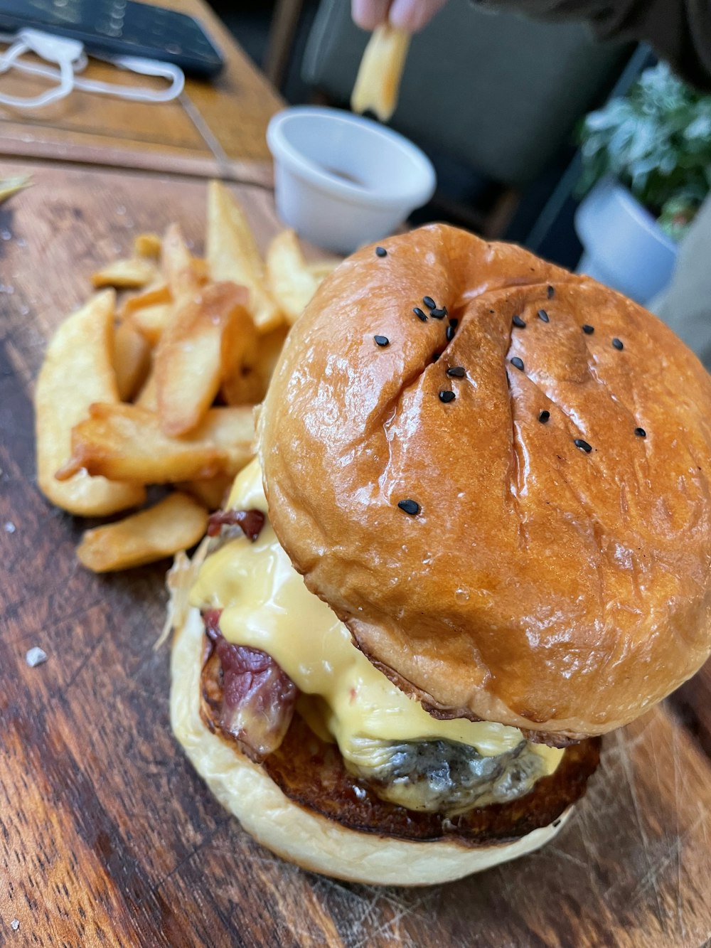 a burger with a side of fries