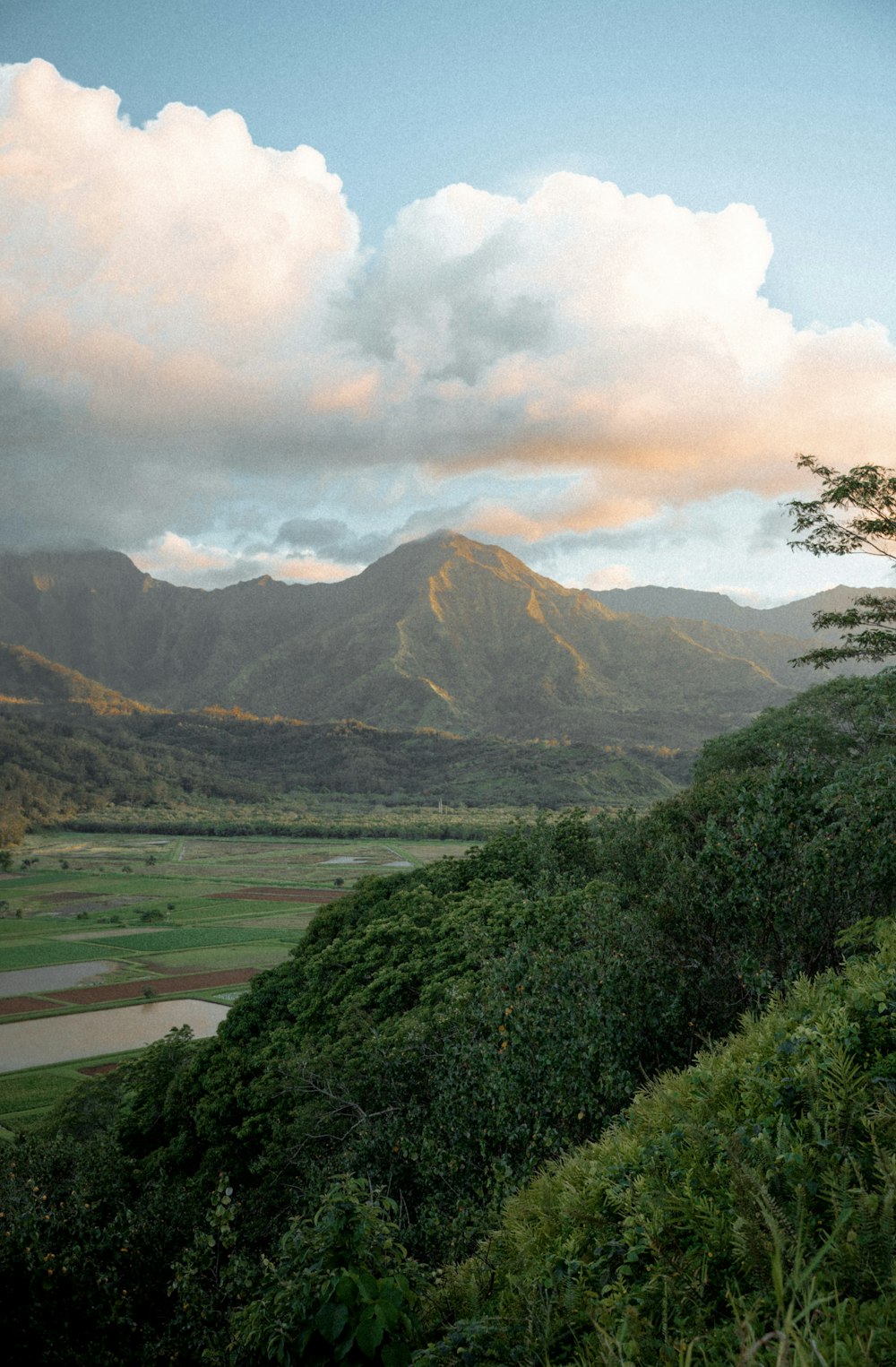 a mountain range with clouds