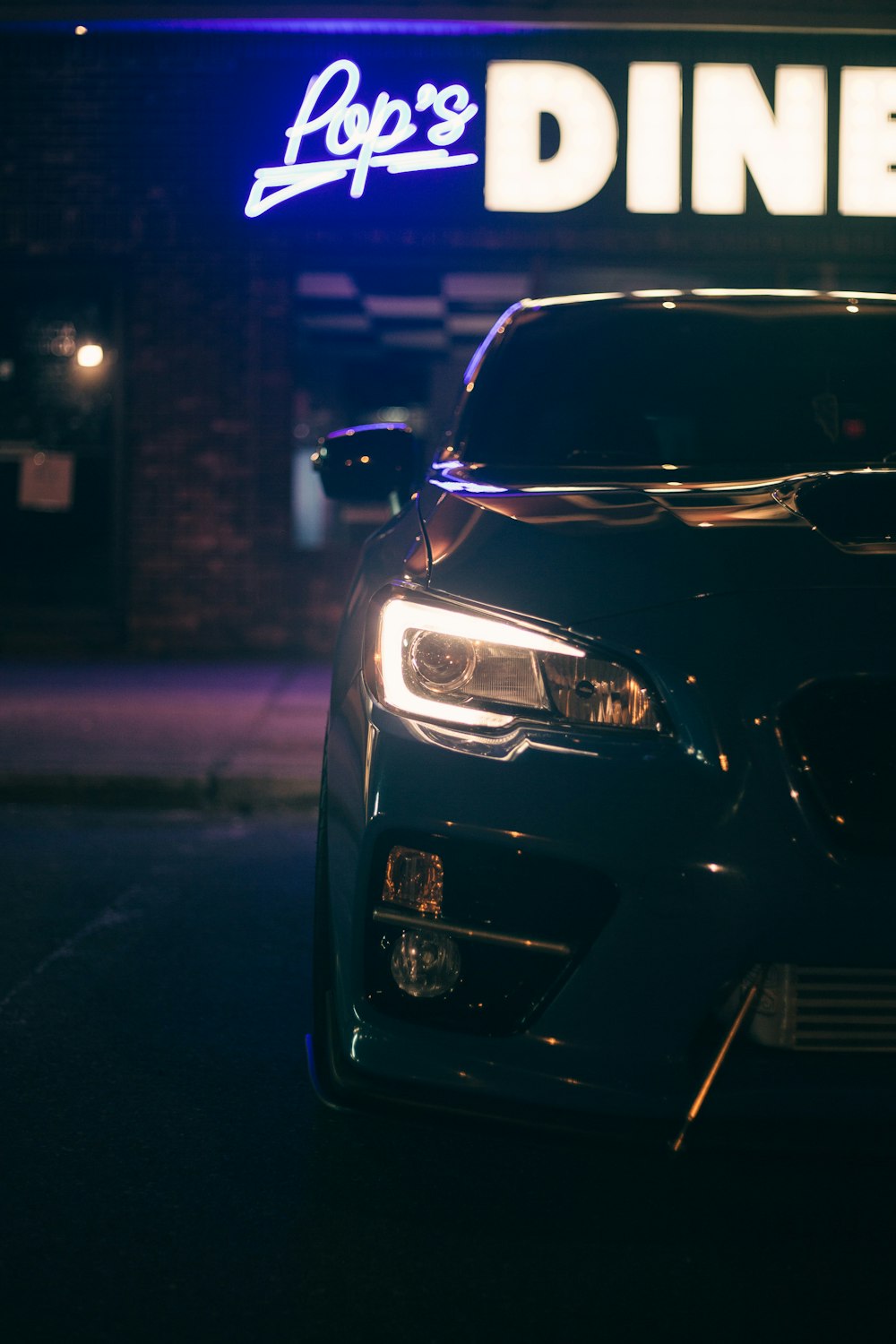 a car parked in front of a building