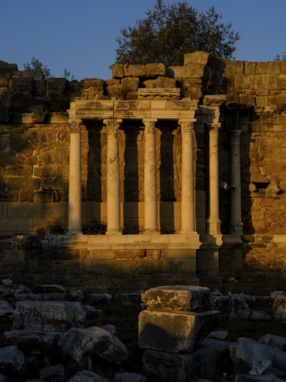 a stone building with pillars