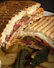a sandwich with meat and vegetables