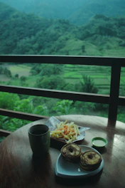 Private balcony with comfortable seating and sweeping views of Bali’s rice terraces.