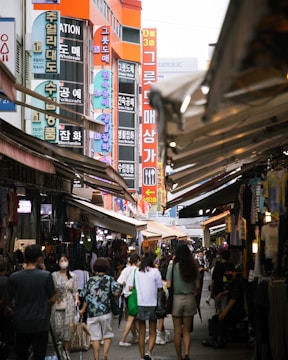 people walking in a busy street