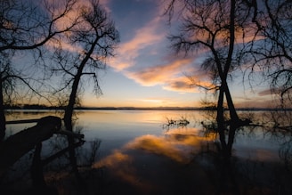 a sunset over a lake
