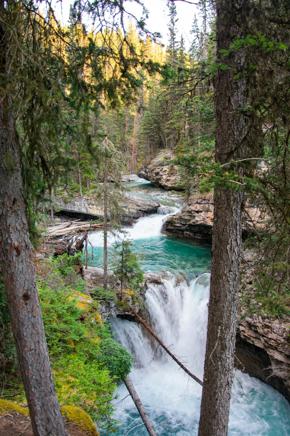 a river with a waterfall