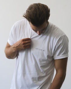 a man wearing a white shirt