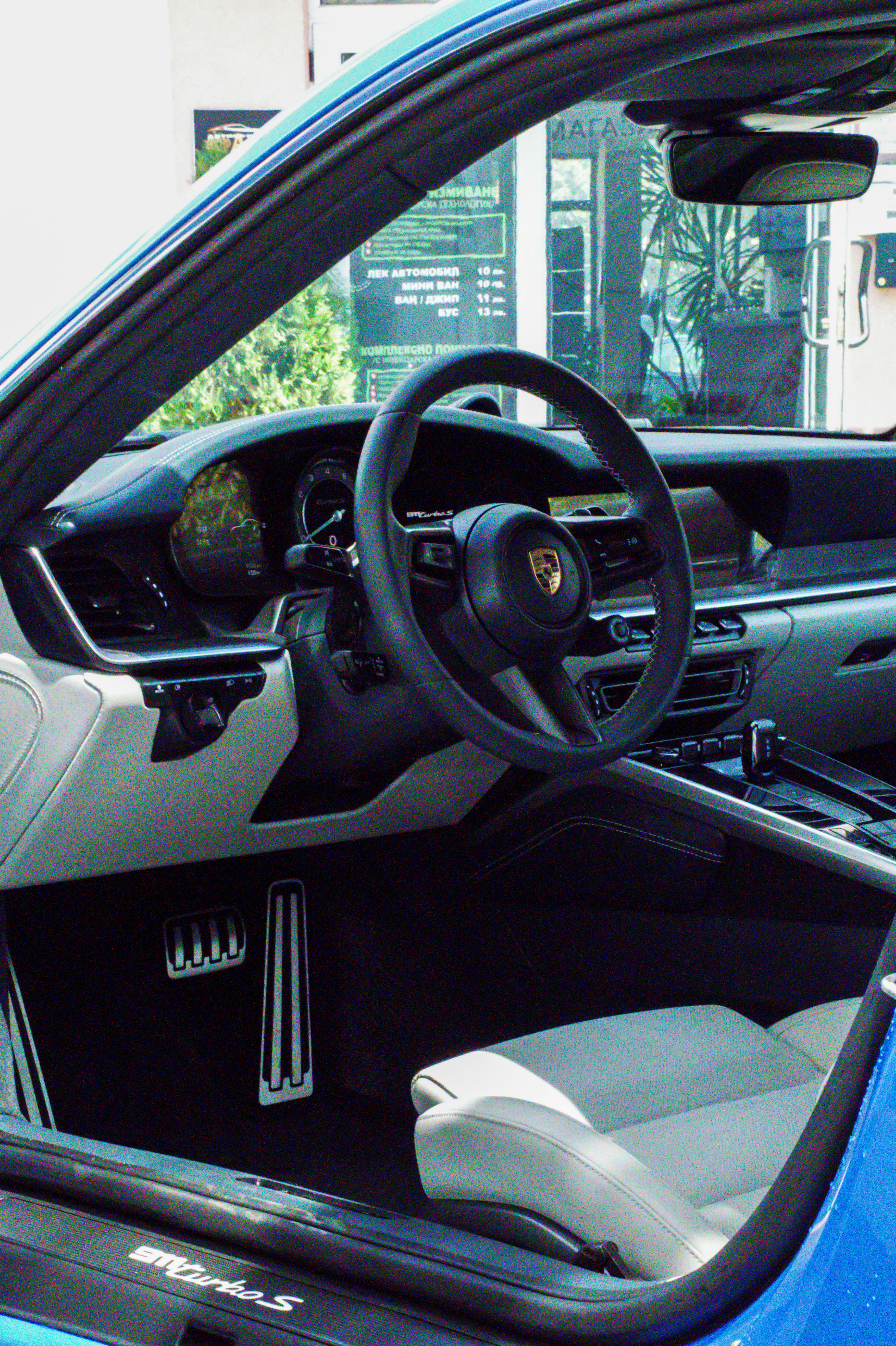 Comfortable car interior showing a personal driver waiting.