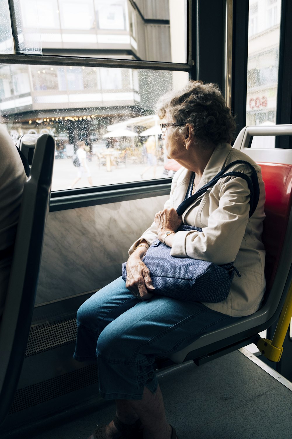 a person sitting on a bus