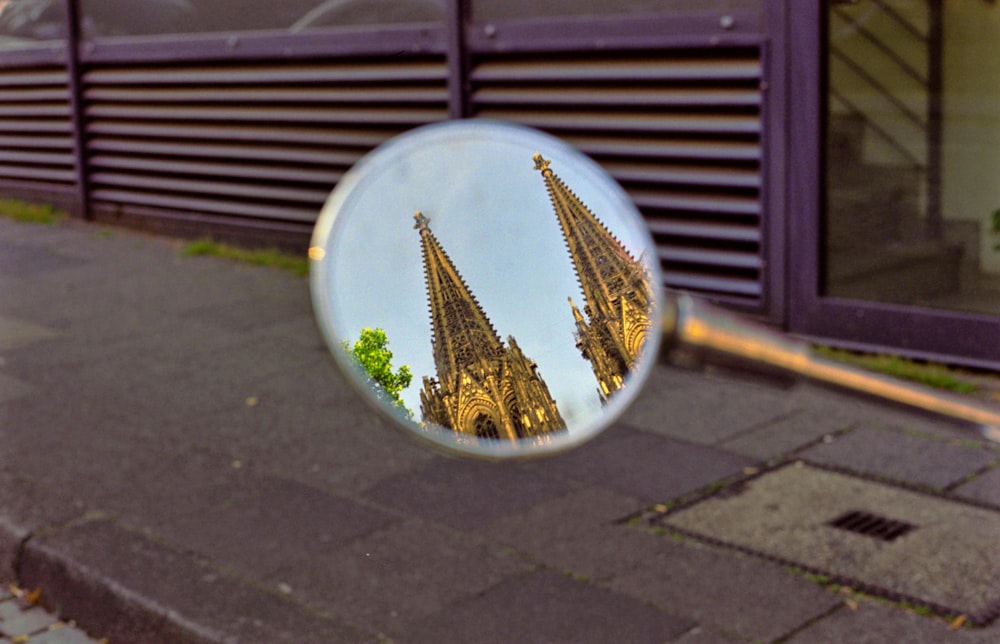 a broken window on a sidewalk